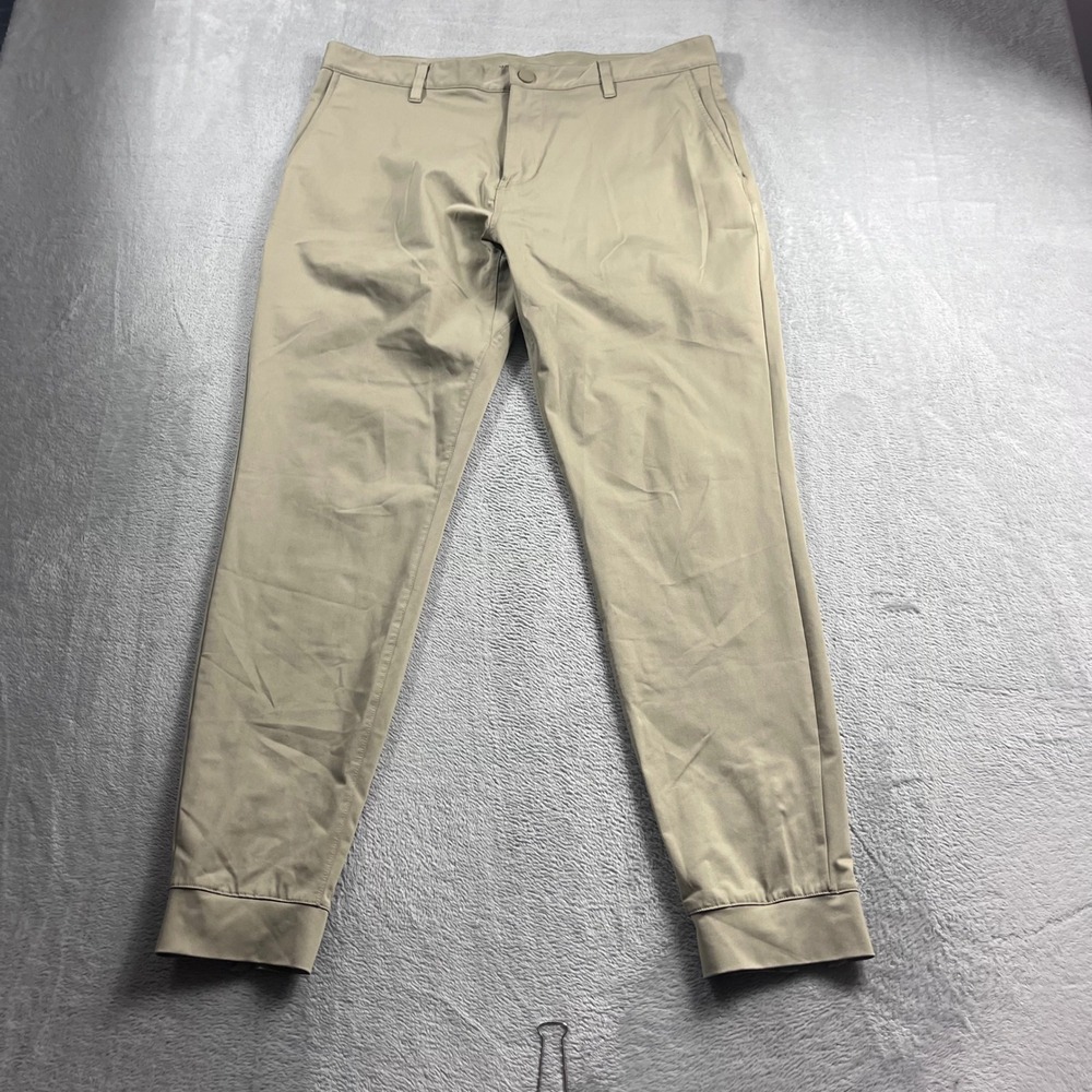 Rhone Commuter Pants Mens 34 Tan Khaki Tapered Leg Performance Chino